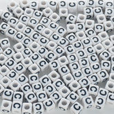 BD00114-02-black-letter-white-opaque-cube-alphabet-beads-single-c-7mm